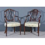 Two Mahogany Shield Back Armchairs of 'Hepplewhite' Design, the seats upholstered in cream cloth and