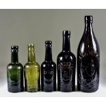 A Collection of English Glass Beer Bottles, Late 19th/Early 20th Century, of dark green and brown