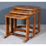 A Nest of Three 1930s Figured Walnut Rectangular Occasional Tables, the tops inlaid with wide