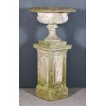 A Cement Garden Urn of Neo Classical Design, the foldover rim with bead mouldings, part reeded body