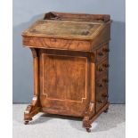A Late Victorian Walnut Davenport, inlaid with satinwood bandings and with galleried top, leather-