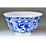 A Dutch Delft Blue and White Bowl, Circa 1700, painted in Transitional style with figures and
