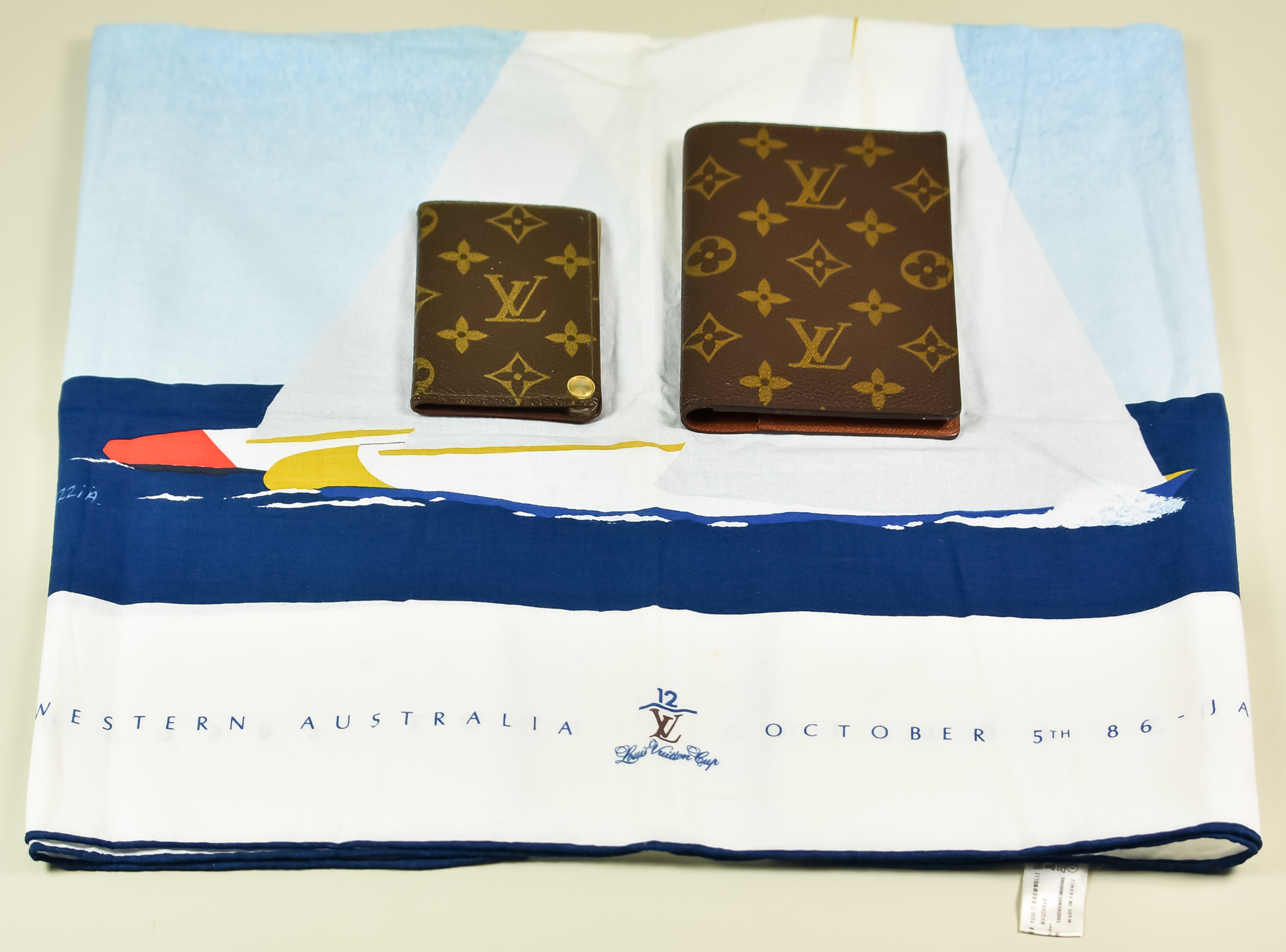 A Louis Vuitton of Paris Card Holder, Wallet and Commemorative Scarf