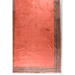 A Late 19th/Early 20th Century Anatolian Carpet "Ushak", woven in colours of terracotta, navy blue