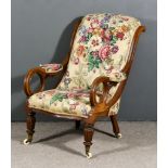 A Victorian Mahogany Framed Scroll Back Easy Chair, with moulded showwood frame, the seat back and