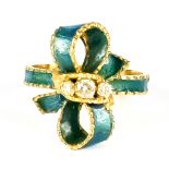A Diamond and Enamel Ring, 20th Century, 18ct gold, set with three small brilliant cut white