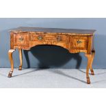 An 18th Century Walnut Lowboy, with crossbanded and moulded edge to top, fitted three frieze drawers