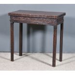 A George III Figured Mahogany Rectangular Tea Table of Chippendale Design, the plain folding top