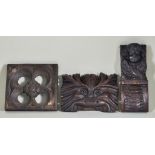 A Small Collection of European and Ethnic Carvings, including - an English oak pierced quatrefoil