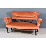 An Edwardian Mahogany Framed Two Seat Settee, upholstered in burnt orange velour, with shaped back