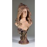 T Schoop (Late 19th/Early 20th Century) - Painted plaster bust of a young woman with irises at her