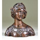Gustave Van Vaerenbergh (1873-1927) - Bronzed metal bust - young lady with elaborately dressed hair,