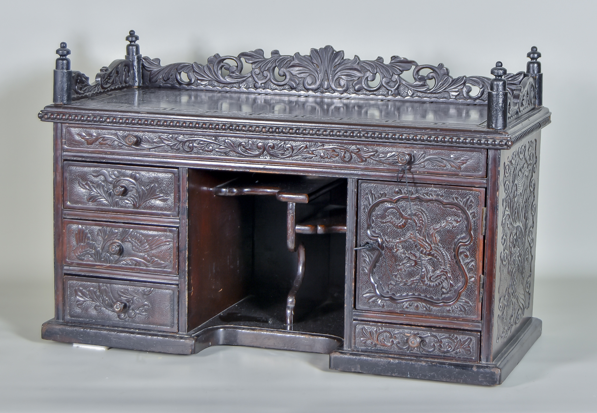 A Late 19th/Early 20th Century Stained Wood Superstructure, with carved and fretted gallery with