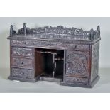 A Late 19th/Early 20th Century Stained Wood Superstructure, with carved and fretted gallery with