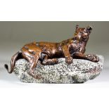 Charles Valton (1851-1918) - Bronze figure of a resting lioness, on granite base, 4.75ins high