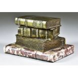 A Bronze Desk Paperweight Modelled as Three Stacked Books, 19th/20th Century, on a polished marble