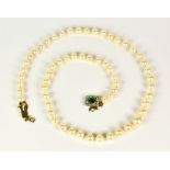 A String of Cultured Pearls, 20th Century, 520mm overall, gem set gold coloured metal clasp Note: