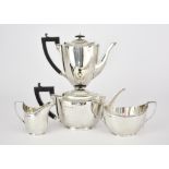 A George V Harlequin Silver Oval Four-Piece tea and Coffee Service, by Daniel and Arter, Birmingham,