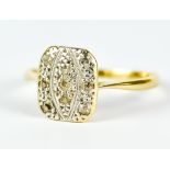 A Diamond Ring, 20th Century, 18ct gold pavé set with a lozenge of small diamonds, size M, gross