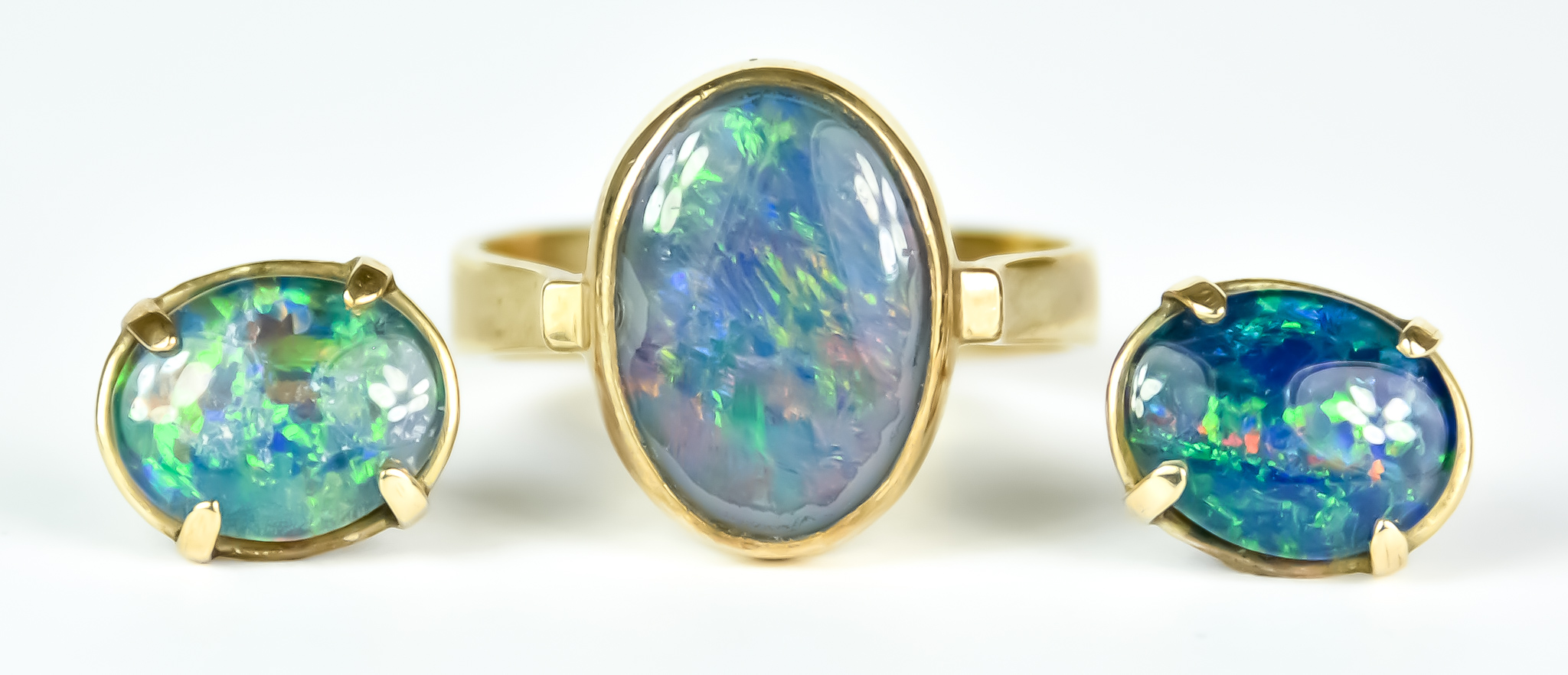 A 9ct Gold Opal Ring with Earrings, 20th Century, opal ring set with centre cabochon opal, size P,