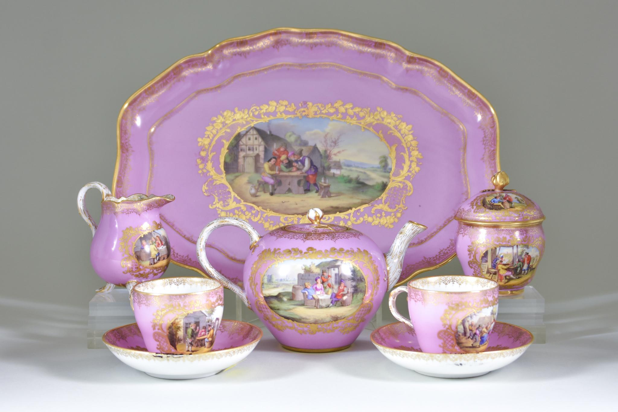 A Meissen Cabaret Set, Second Half of 19th Century, enamelled with peasants in the style of Teniers,