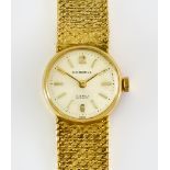 A 9ct Gold Lady's Cocktail Watch, 20th Century, by Cornell, 18mm diameter, silvered dial with gold