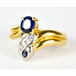 A Sapphire and Diamond Ring, Modern, 18ct gold, set with a sapphire, approximately .50ct, a