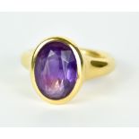 An 18ct Gold Faceted Amethyst Ring, Early 20th century, set with a faceted amethyst stone,