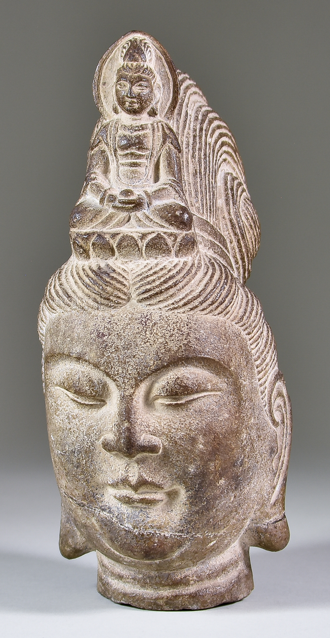 A Chinese Carved Stone Head of Buddha in Tang Style, 20th Century, 11ins (28cm) high
