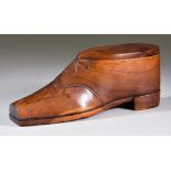 A Yew Wood Boot-Pattern Table Snuff Box, 19th Century, the lid and heel with piqué work, 7ins wide