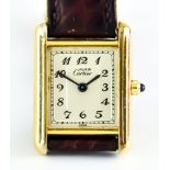 A Lady's Quartz Wristwatch, by Cartier, serial No. 5057001, model Tank Quartz, plated case, 20mm x