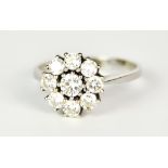 A 14ct White Gold Diamond Cluster Ring, Modern, set with brilliant cut white diamonds in the form of