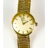 A 9ct Gold Lady's Cocktail Watch, 20th Century, by Omega, 18mm diameter, silvered dial with gold