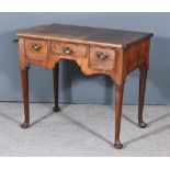 A George II Mahogany Lowboy, the top with moulded edge and re-entrant front corners, fitted three