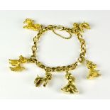 A 9ct Gold Poodle Bracelet, 20th Century, chain bracelet with six suspended poodle dog charms,