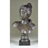 Emmanuel Villanis (1858-1914) - Bronzed metal bust of young woman, her hair dressed in a bun,