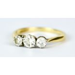 An 18ct Gold Three Stone Diamond Ring, 20th Century, set with three brilliant cut white diamonds,