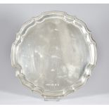 An Elizabeth II Silver Circular Tray, by Peter Charles Maxwell Alwyn, London 1990, with shaped and