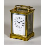 A Late 19th Century French Carriage Clock, by Hamilton & Inches, Paris, No.4666, the white enamel