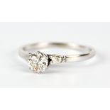 A Solitaire Diamond Ring, Modern, the white coloured metal set with a brilliant cut round diamond,