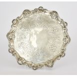 A George III Silver Circular Salver, by Ebenezer Coker, London, 1763, the shaped and moulded rim