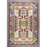 An Anatolian Carpet of "Kazak" Design, woven in pastel shades with a central pole medallion, the