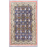 A 20th Century Part Silk Kashan Rug, woven in pastel shades, the field filled with endless floral