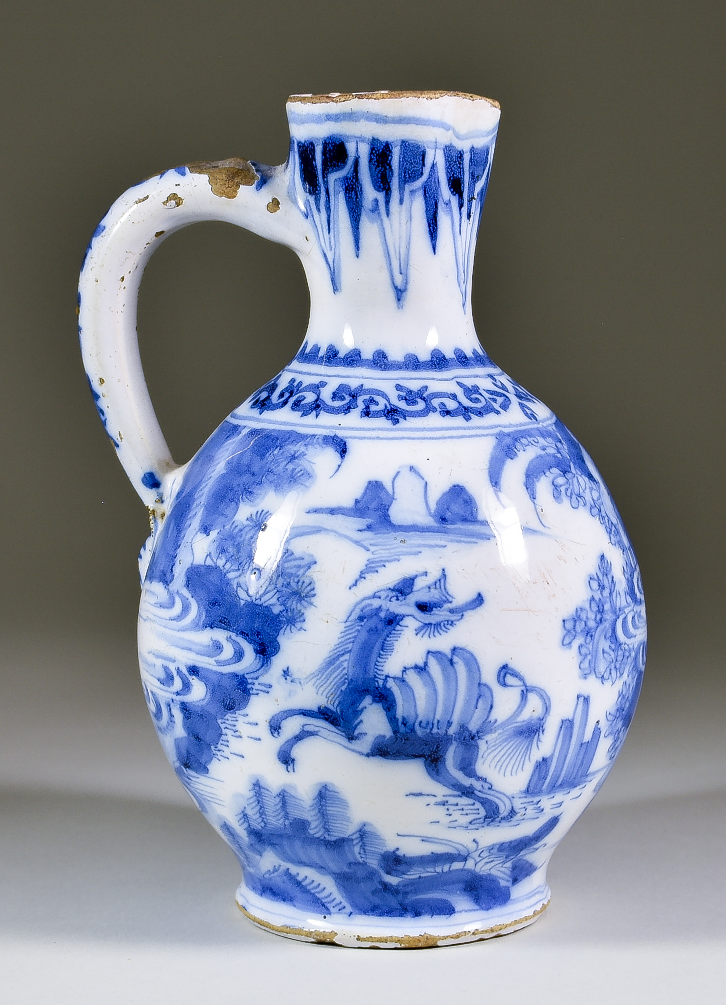 A Frankfurt or Hanau Blue and White Tin-Glazed Jug, Early 18th Century, painted in Chinese taste