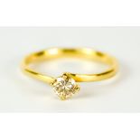 A Solitaire Diamond Ring, Modern, in 18ct gold mount, set with a round brilliant cut diamond,