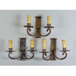 Three English Wrought Iron Two-Branch Wall Light Brackets, 20th Century, of rustic form, 8.5ins high