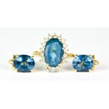 An 18ct Gold Blue Topaz and Diamond Ring with Earrings, 20th Century, ring set with a centre faceted