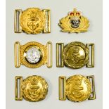 Five Naval Brass and Gilt Metal Belt Buckles and One Cap Badge