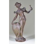 Charles Théodore Perron (1862-1934) - Bronzed spelter - standing figure of a lady holding a bottle