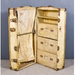 An Early 20th Century French Fibre, Leather and Metal Mounted Cabin/Wardrobe Trunk, the trunk with